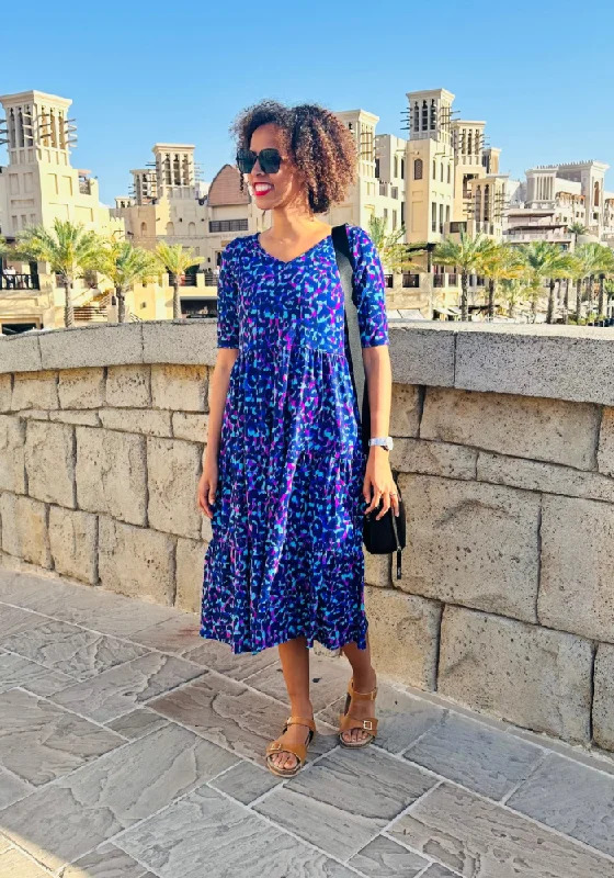 Don’t Miss Out Carney Animal Print Tiered Midi Dress