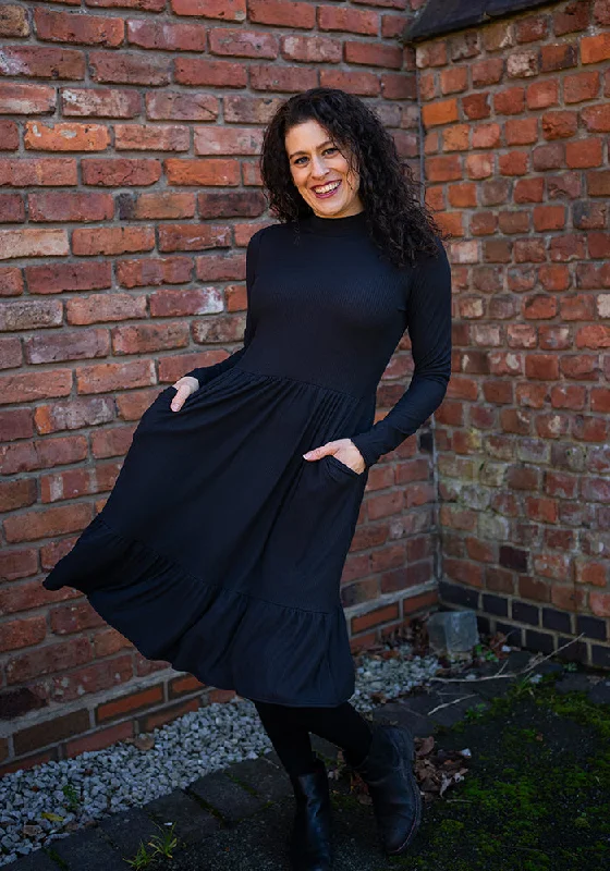 Act Fast Lilah Black Turtle Neck Tiered Hem Dress